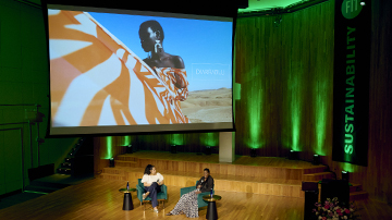 View from the audience at a presentation on stage for the Sustainability Design Conference