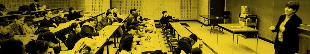 Professor with Student in Classroom