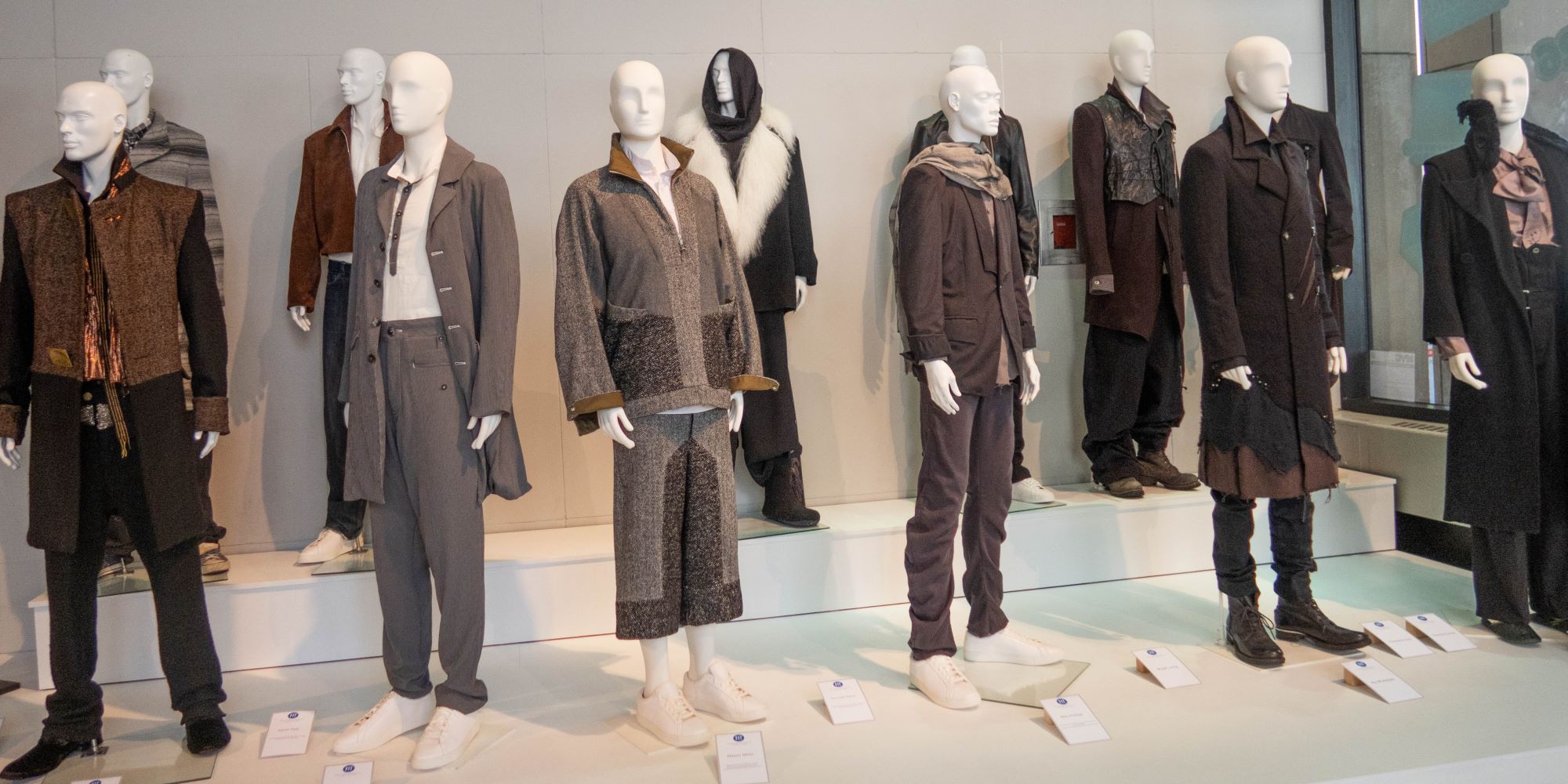 Menswear fashion designs modeled on mannequins