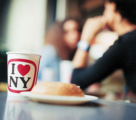 Coffee cup and bagel