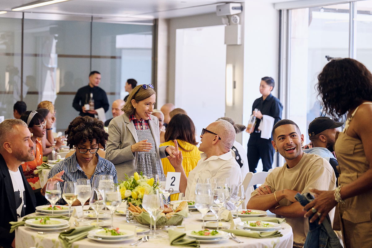 seated guests mingle at a luncheon