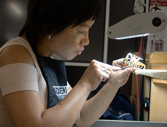 FIT student creating jewelry