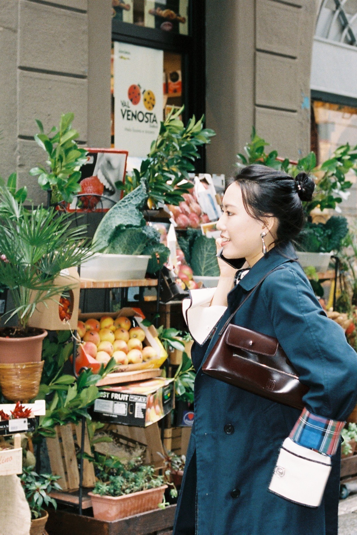 student at a local market in Milan