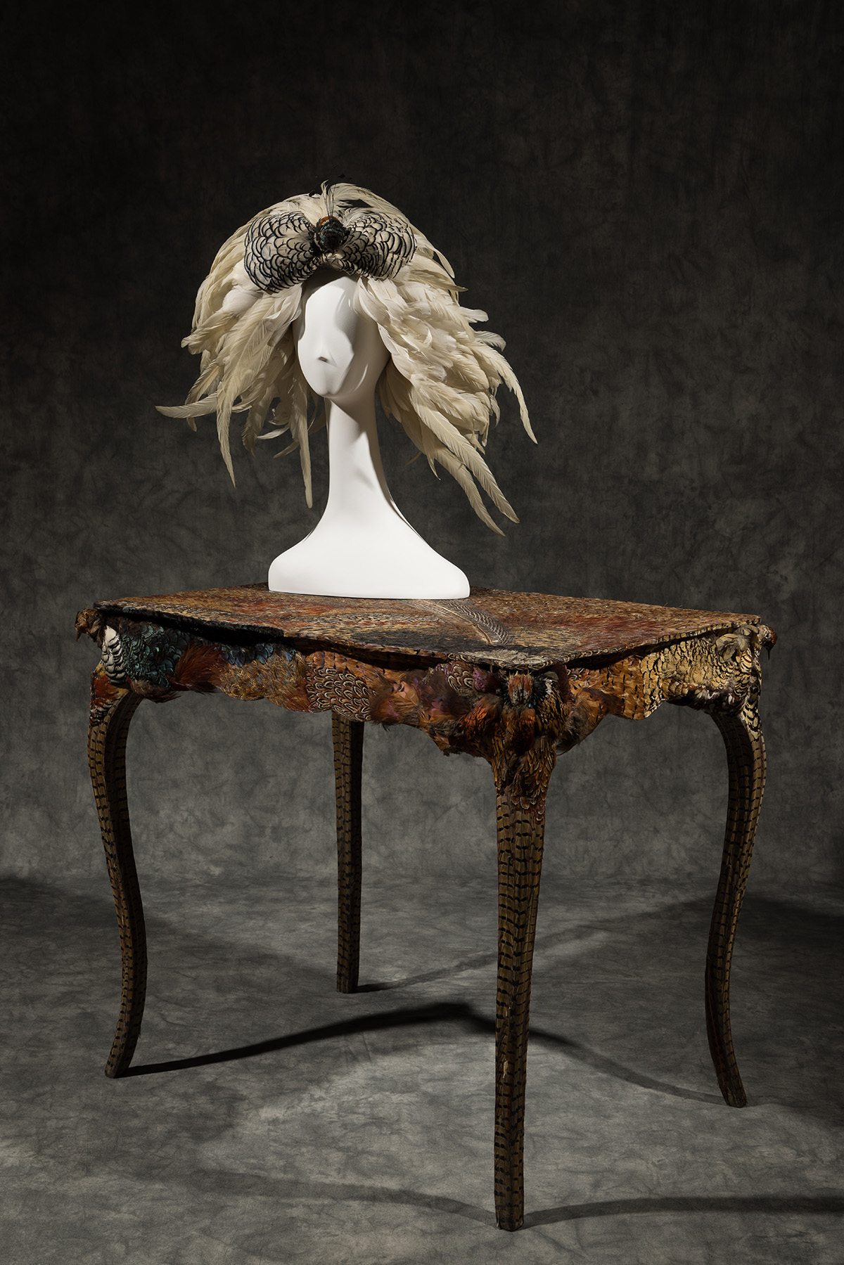 feathered headdress on table