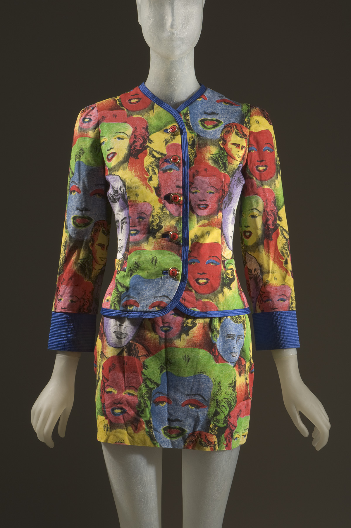 cropped jacket and mini skirt with multicolor allover Andy Warhol print featuring faces of Marylin Monroe and James Dean