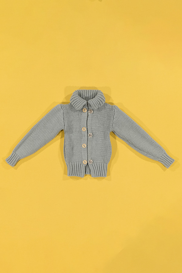 grey knit sweater with ribbed hemline, cuffs, and rollover collar