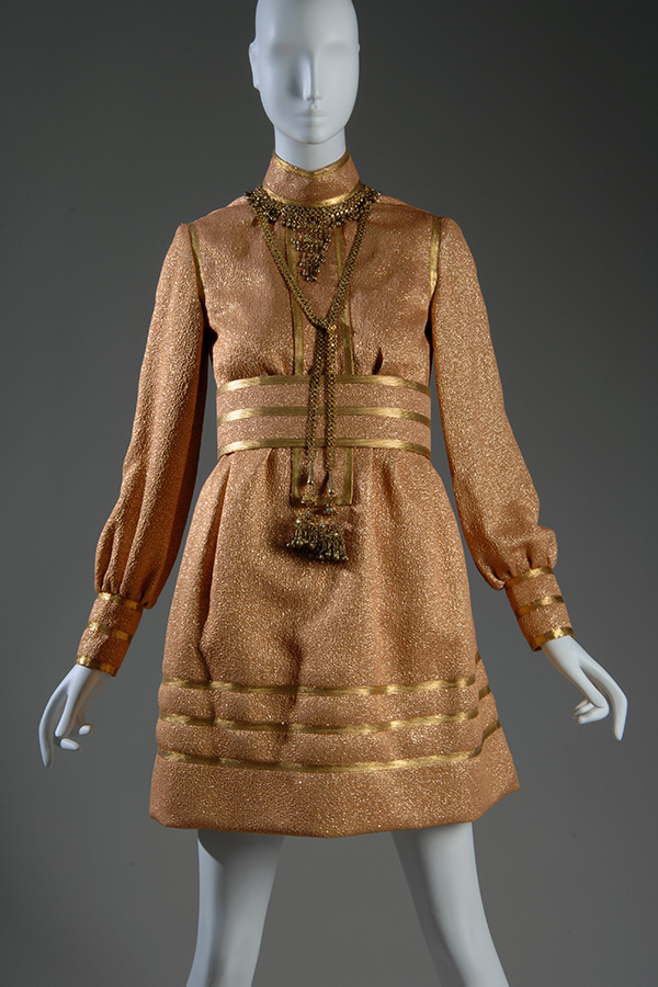 gold lame, tan crepe long sleeve dress with braided cord