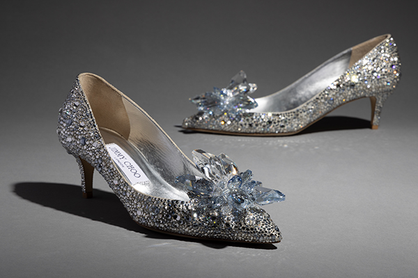 Pair of silver, sparkly kitten-heeled shoes